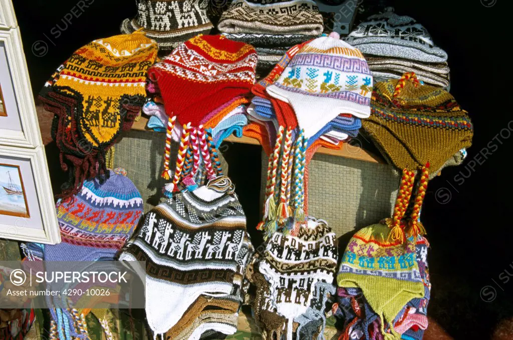 Woollen knitted hats on stall, Indian Market, Lima, Peru