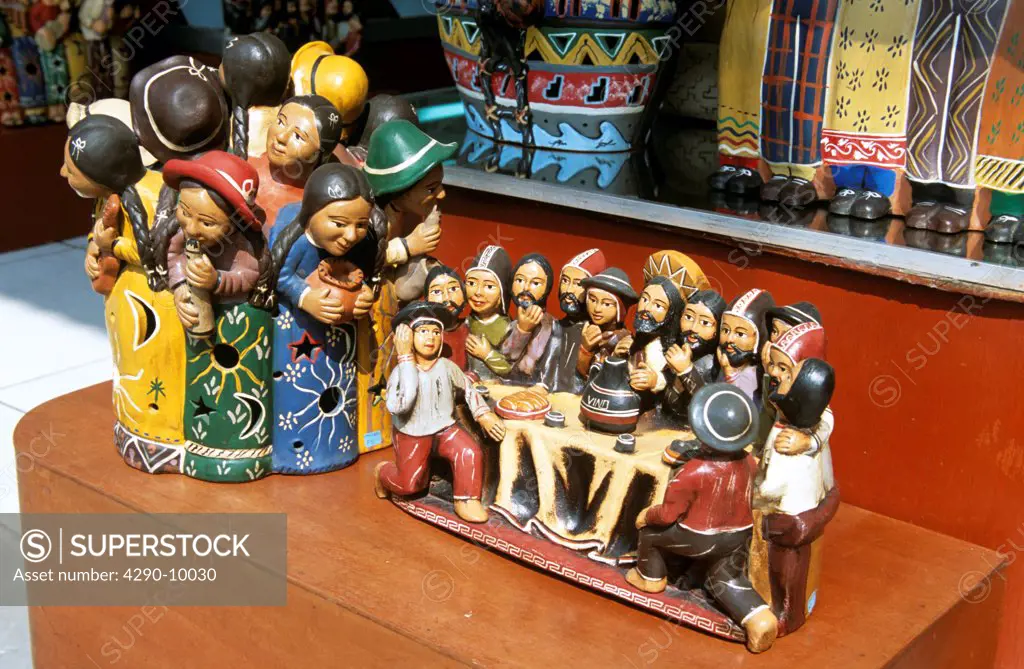 Colourful ornaments including model of the Last Supper, outside gift shop, Indian Market, Lima, Peru