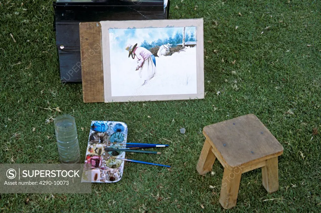 Painting, stool and artists palette on a lawn, near Arequipa, Peru