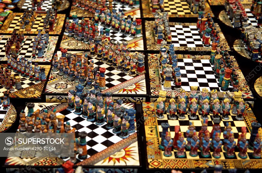 Colourful unusual chess sets on stall, Pisac Market, Pisac, near Cusco, Peru