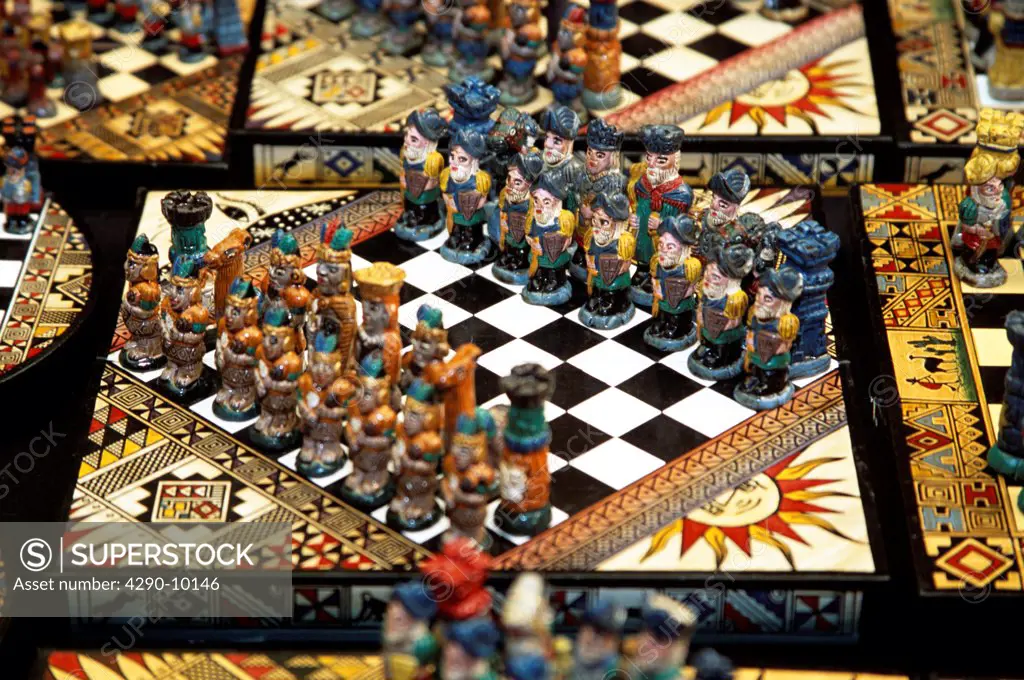 Colourful unusual chess set on stall, Pisac Market, Pisac, near Cusco, Peru