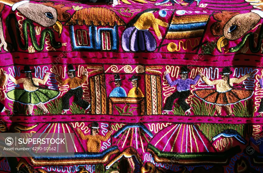 Colourful patterned embroidered cloth in the market, Ollantaytambo, Sacred Valley of the Incas, near Cusco, Peru