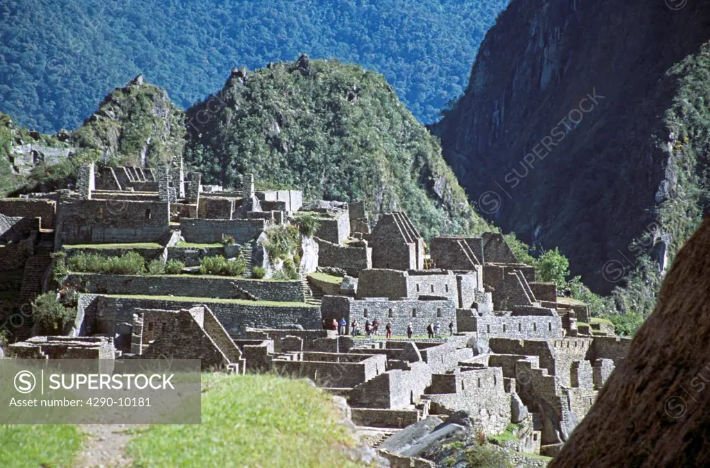 Inca ruins and visitors, Machu Picchu, Peru