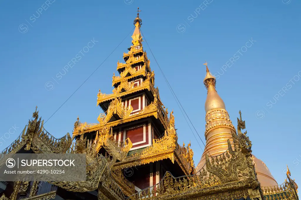 Ornate roof of a prayer hall and main stupa at Shwedagon Pagoda, Yangon, (Rangoon), Myanmar, (Burma)