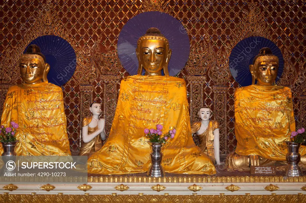 Buddha statues at Shwedagon Pagoda, Yangon, (Rangoon), Myanmar, (Burma)