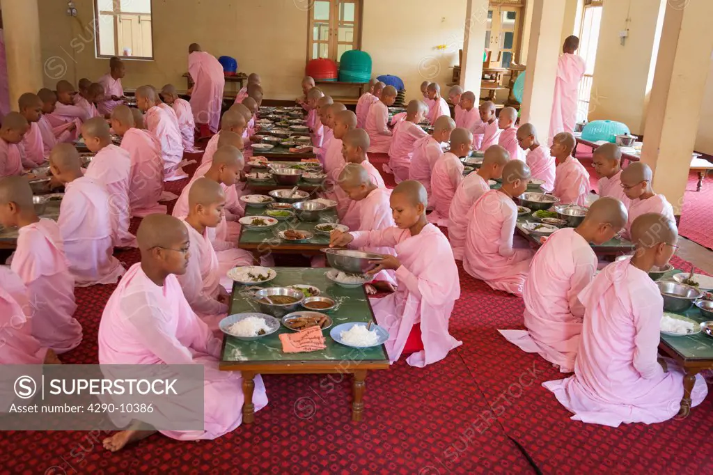Nuns eating their meals, Sakyadhita Thilashin Nunnery School, Sagaing, near Mandalay, Myanmar, (Burma)
