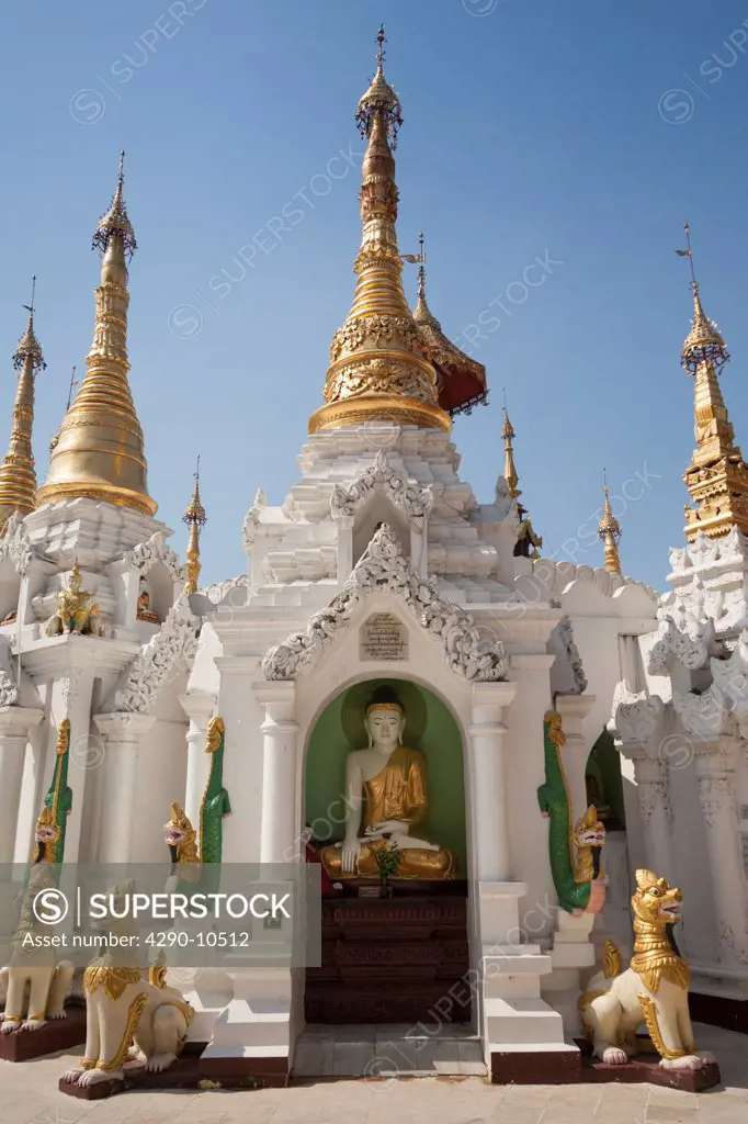 A Buddha statue in a stupa at Shwedagon Pagoda, Yangon, (Rangoon), Myanmar, (Burma)