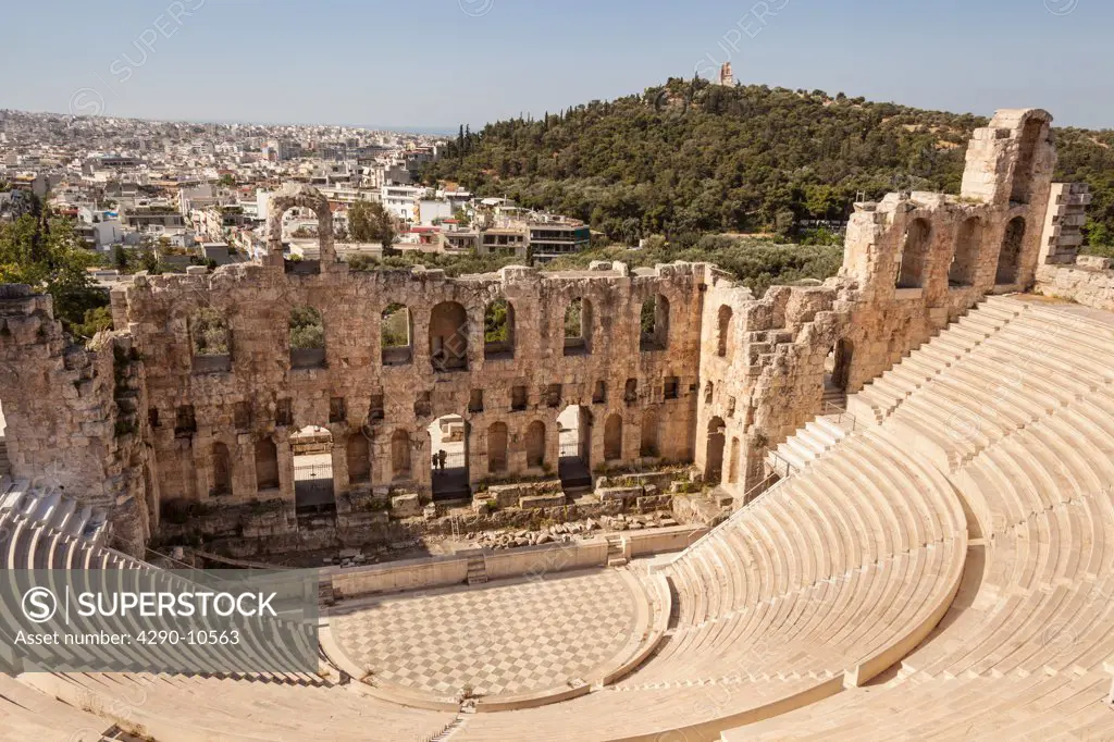 Odeon of Herodes Atticus at the Acropolis with Philopappos Monument on Filopappos Hill in the background, Athens, Greece