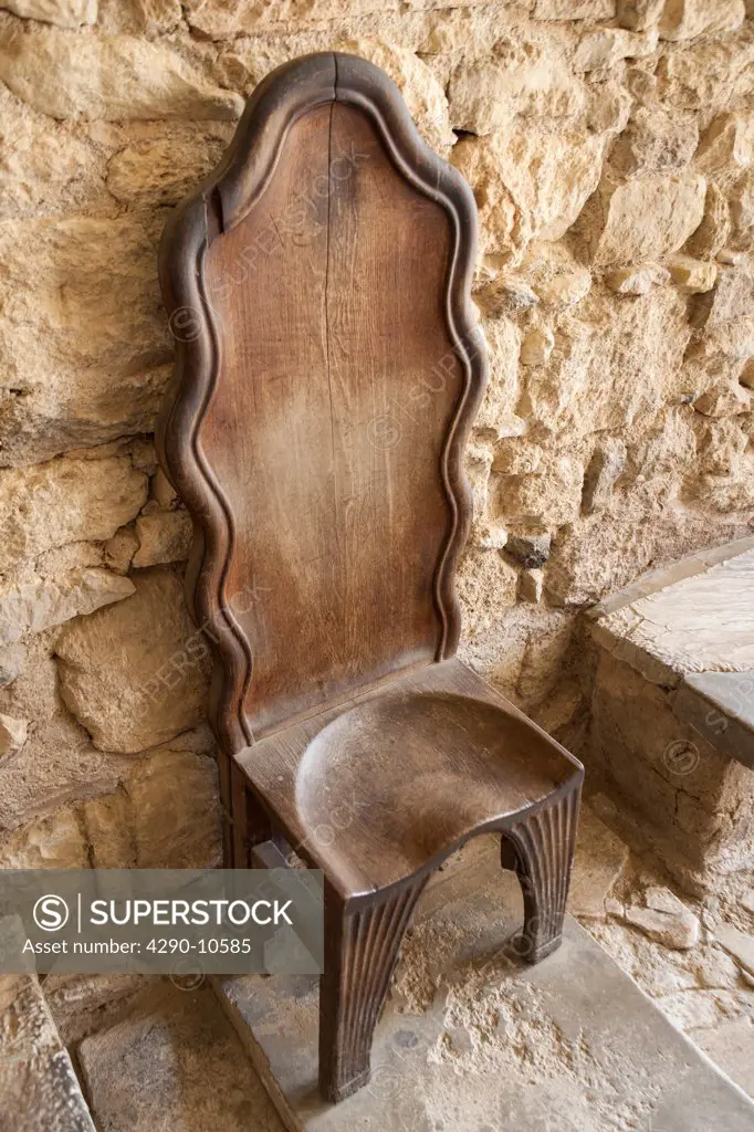 Old carved wooden seat beside the throne hall, Knossos Palace, Knossos, Crete, Greece