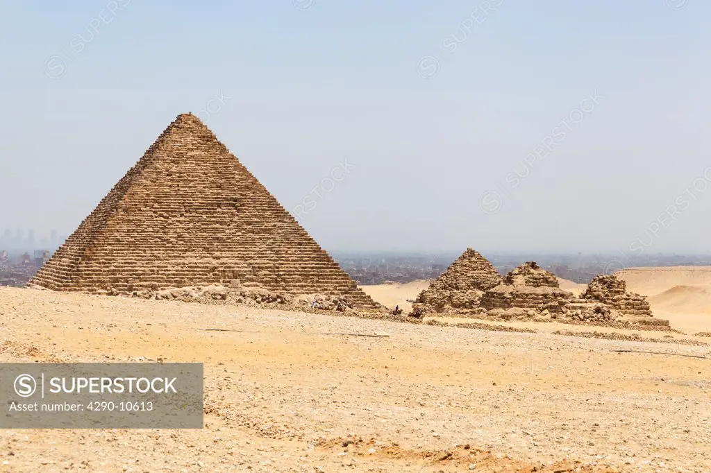 Pyramid of Menkaure and the three small Queen's Pyramids in the Giza Necropolis, Giza, Cairo, Egypt