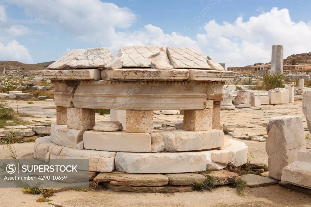 Ruins of small circular building in the Agora of the Competaliasts, Delos, Mykonos, Greece