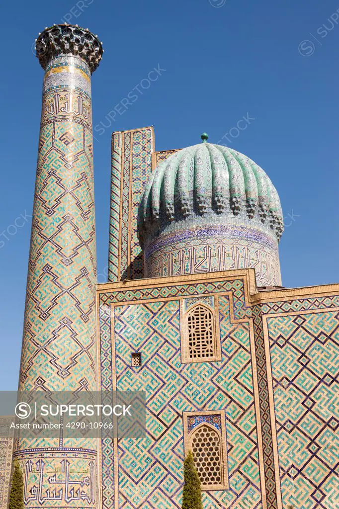 A minaret and dome of Sher Dor Madrasah, also known as Shir Dor Madrasah, Registan Square, Samarkand, Uzbekistan