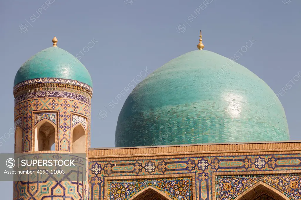 A minaret and dome, Tilla Kari Madrasah, also known as Tillya Kari Madrasah, Registan Square, Samarkand, Uzbekistan