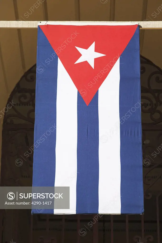 Cuban flag suspended from the Palacio Provincial, Santiago de Cuba, Cuba
