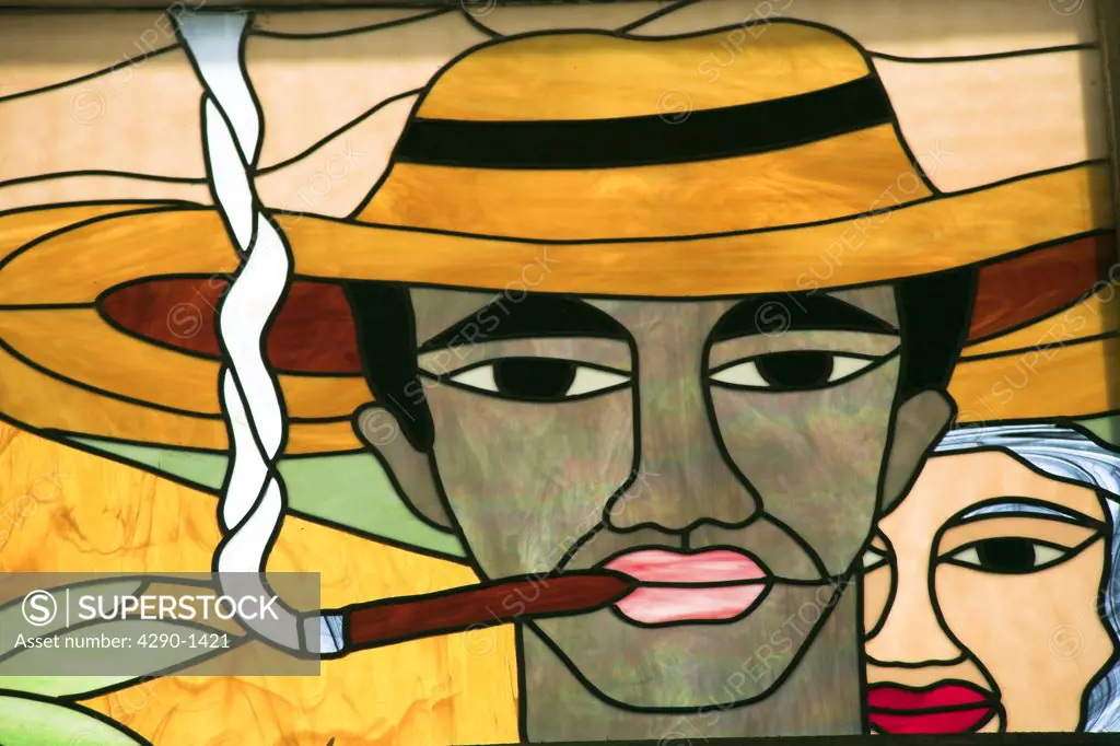 Colourful stained glass window of man smoking a cigar, Trinidad, Sancti Spiritus, Cuba