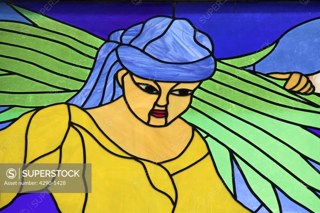 Colourful stained glass window of woman carrying farming produce on her shoulder, Trinidad, Sancti Spiritus, Cuba