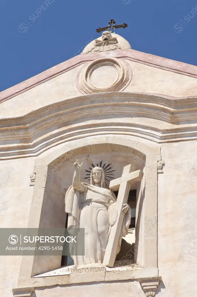 Statue of Jesus Christ on facade of San Giuseppe Church, Piazza IX Aprile, Taormina, Sicily, Italy