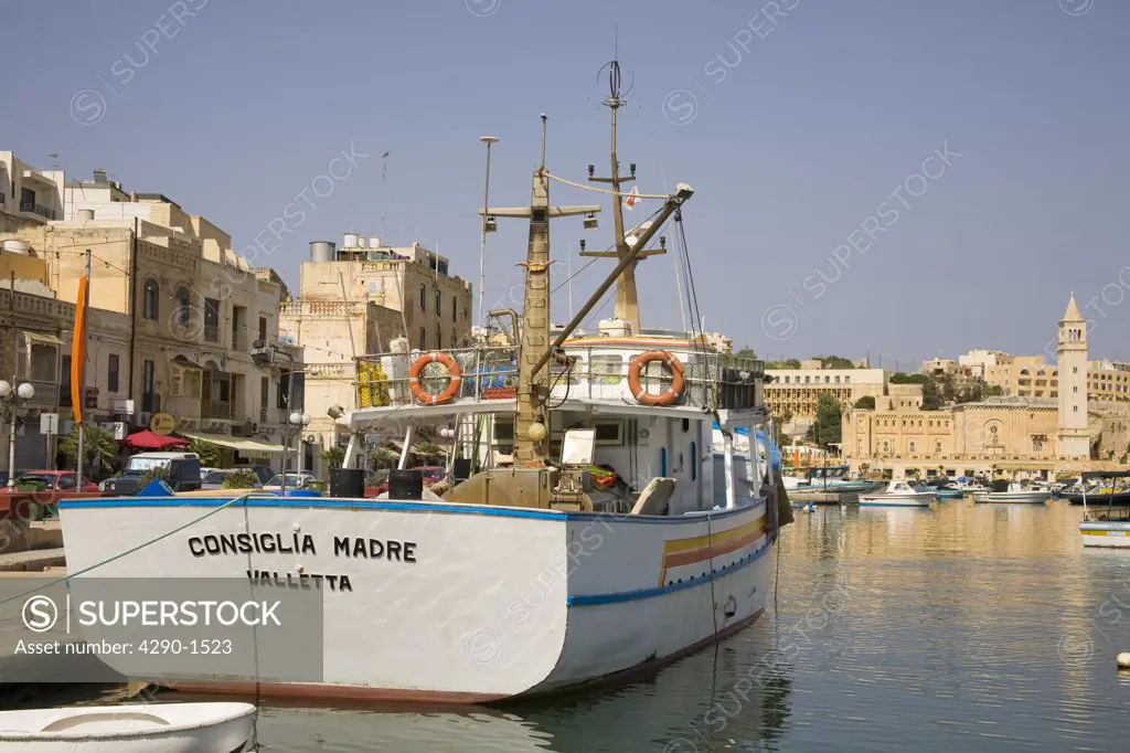 Large boat moored at the quayside, Marsascala Harbour, Marsascala, Malta