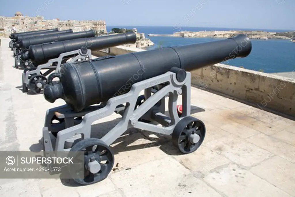 Cannons, the noon day gun, Saluting Battery, Upper Barracca Gardens, and Grand Harbour, Valletta, Malta