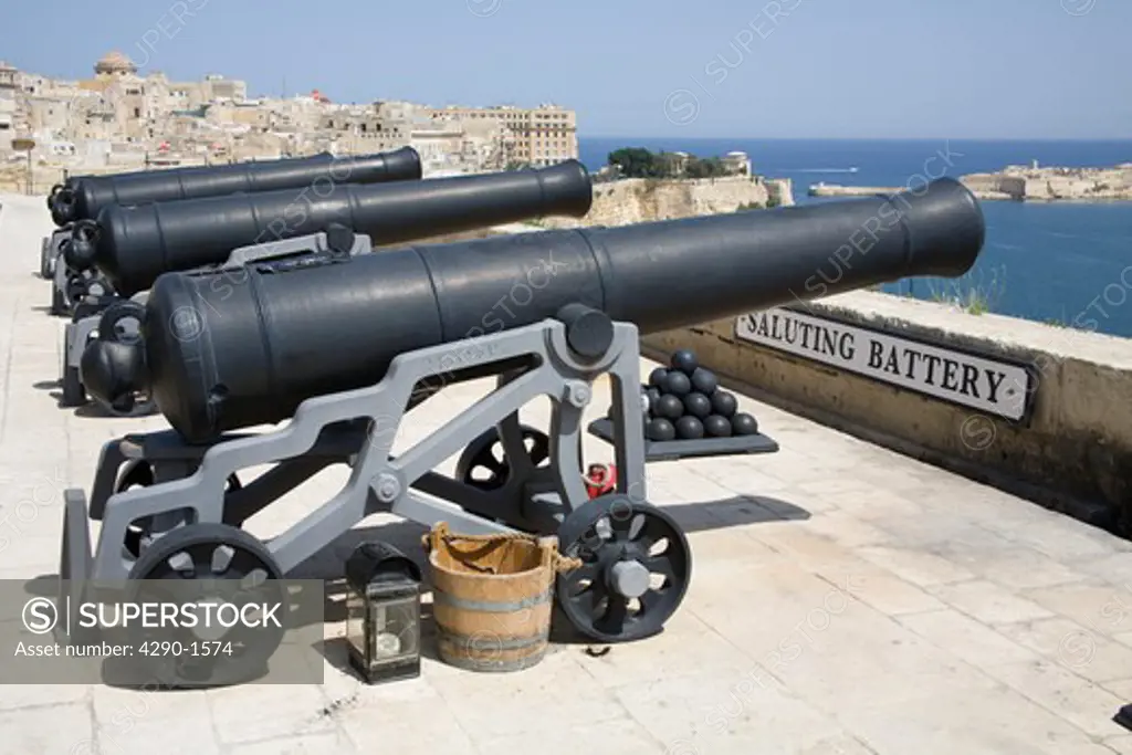 Cannons, the noon day gun, Saluting Battery, Upper Barracca Gardens, and Grand Harbour, Valletta, Malta