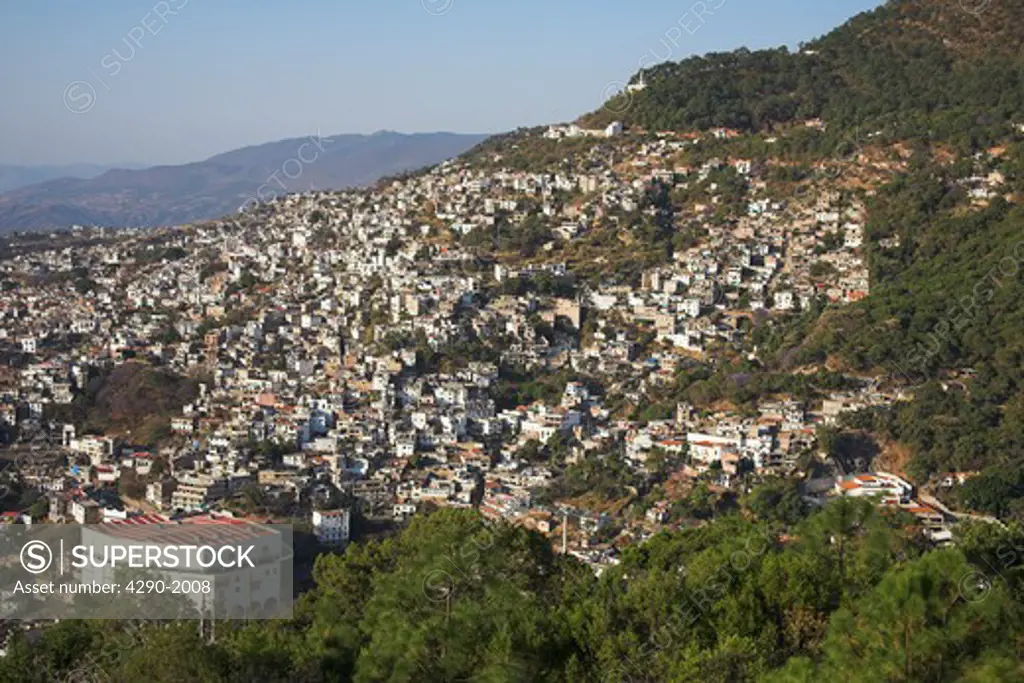 View of the town of Taxco built onto the hillside, Taxco, Mexico