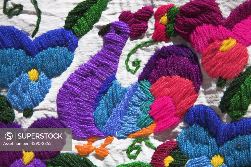 Colourful woollen embroidery for sale outside gift shop, Palenque, Chiapas, Mexico