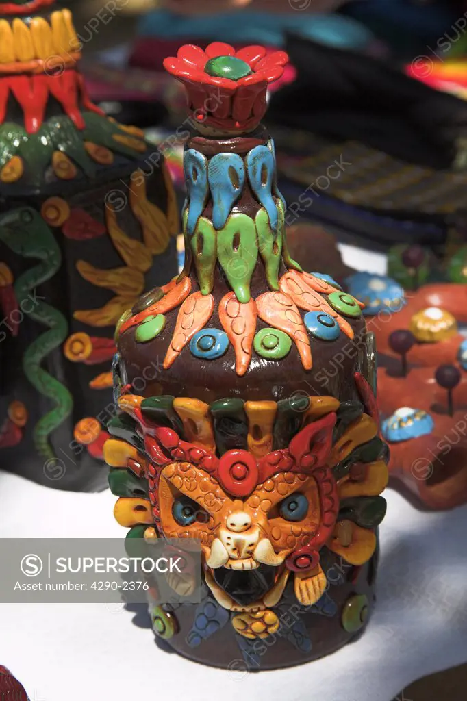 Patterned colourful ceramic bottle for sale outside gift shop, Palenque, Chiapas, Mexico