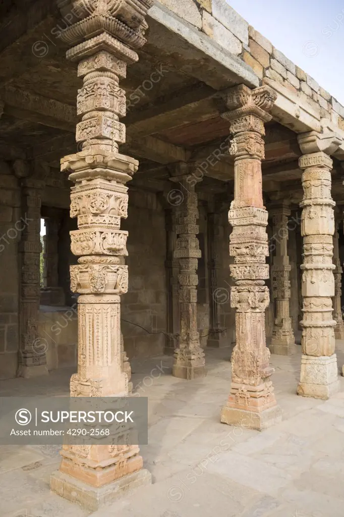 Carved pillars and covered area in the Qutb Minar Complex, Delhi, India