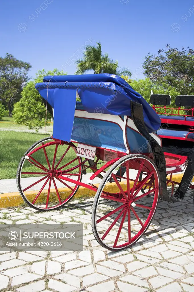 Horse drawn open top carriage, a Cuban taxi, Guardalavaca, Holguin Province, Cuba