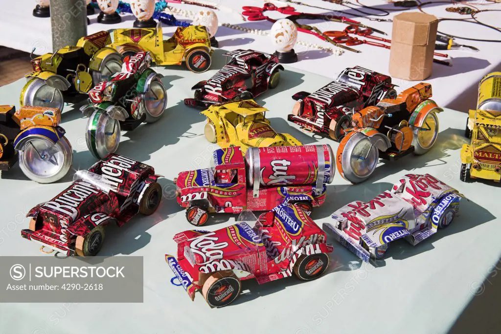 Toy vehicles made from used tin cans on a market stall in the Craft Market, Guardalavaca, Holguin Province, Cuba