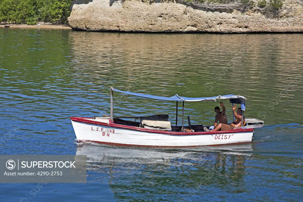 Fishermen on fishing boat, near Cayo Granma, Santiago Bay, Santiago de Cuba, Cuba