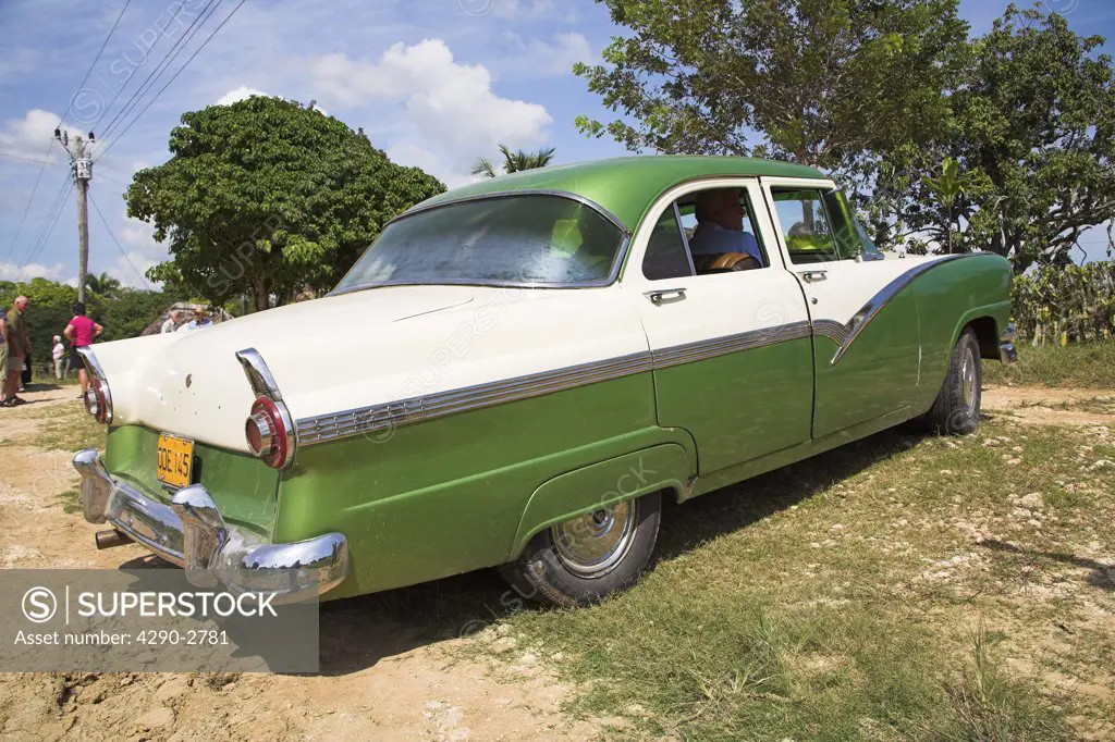 Classic American green car, near Santiago de Cuba, Cuba