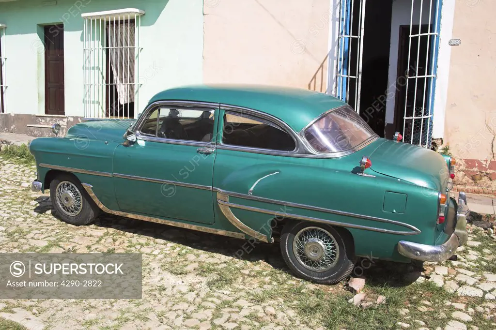 Classic green car parked at the roadside, Trinidad, Sancti Spiritus Province, Cuba