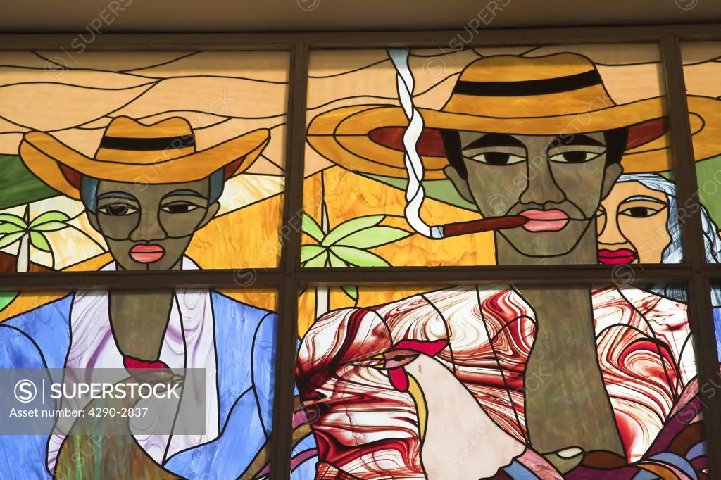 Colourful stained glass window of man smoking a cigar, Trinidad, Cuba