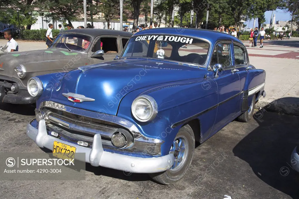 Classic American Chevrolet car parked at the roadside, Havana, La Habana Vieja, Cuba