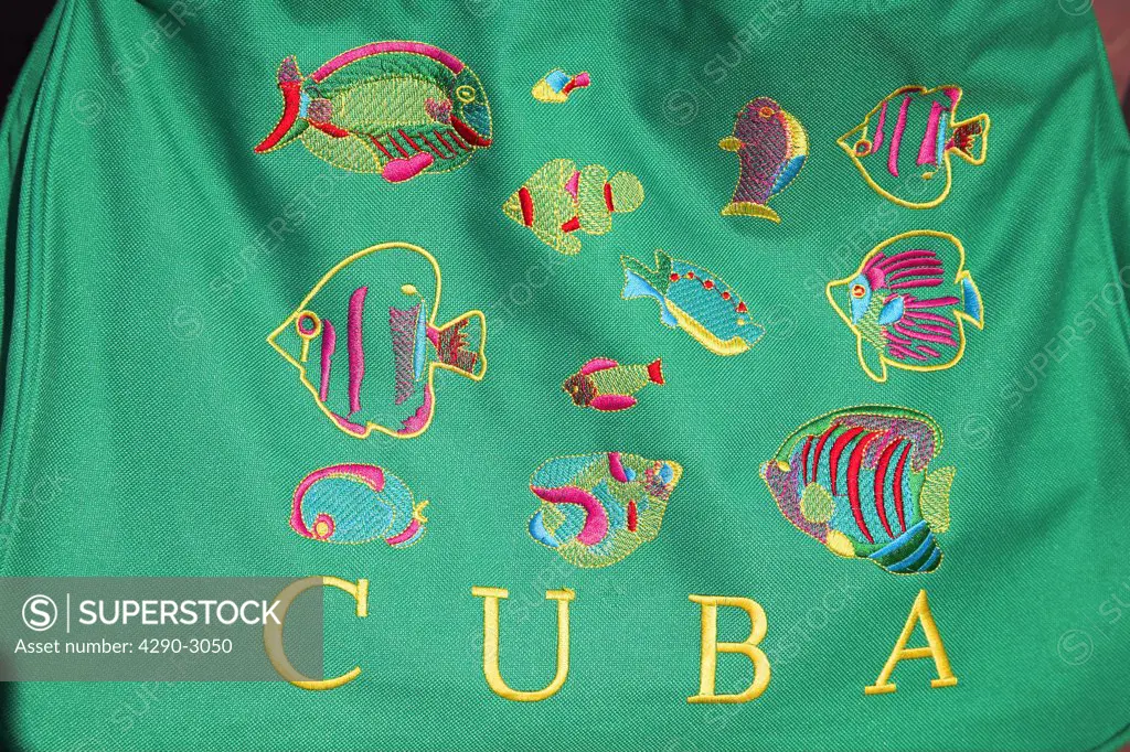 Brightly coloured green Cuba shopping bag on display outside a shop, Havana, La Habana Vieja, Cuba
