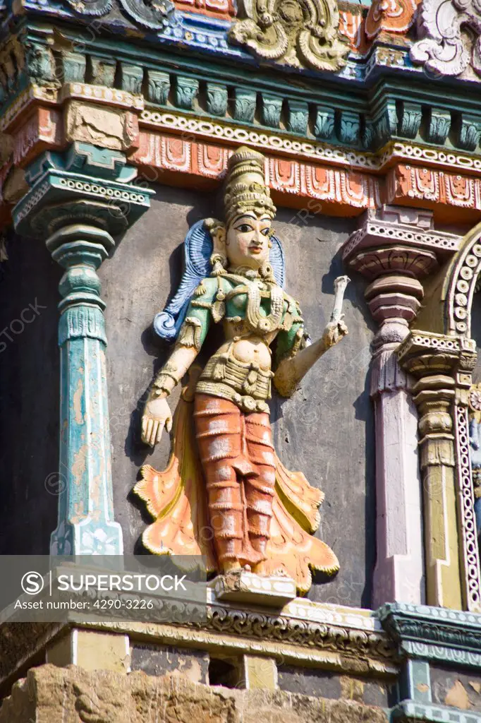 Carved figure on a gopuram, Meenakshi Temple, Madurai, Tamil Nadu, India