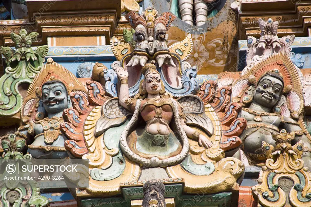 Carved Hindu figures on a gopuram, Meenakshi Temple, Madurai, Tamil Nadu, India