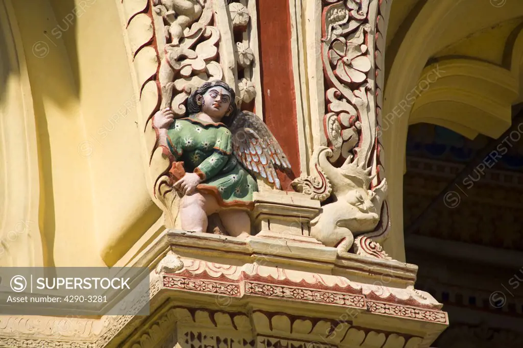 Carved statue on outside wall of Thirumalai Nayak Palace, Madurai, Tamil Nadu, India