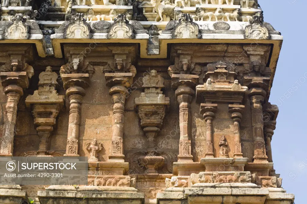 Carved columns and statues on gopuram, Sree Padmanabhaswamy Temple, Trivandrum, Kerala, India