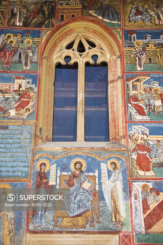 Frescoes on outside wall above entrance, Voronet Monastery, near Gura Humorului, Bucovina, Moldavia, Romania