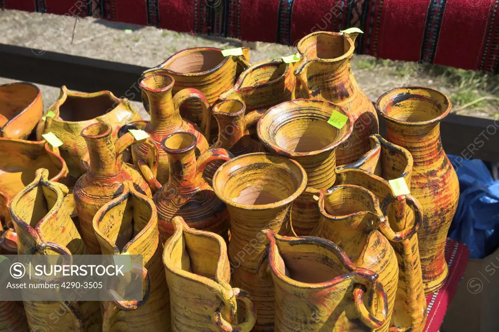 Colourful pottery vases and jugs for sale outside gift shop, Bran Castle, Bran, near Brasov, Transylvania, Romania
