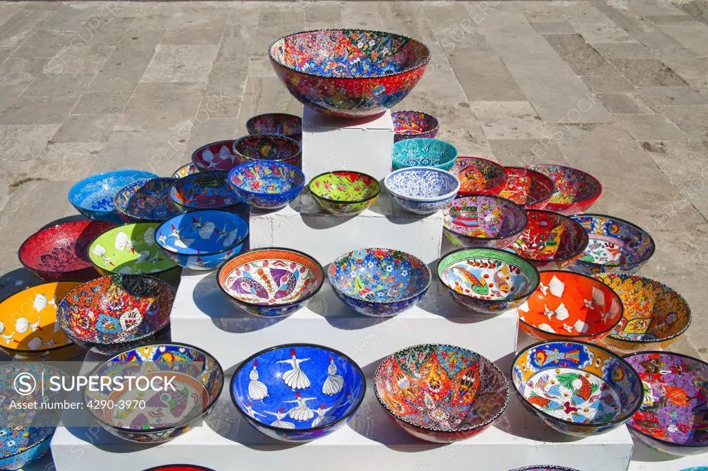 Colourful ceramic pottery bowls for sale in a street market, Istanbul, Turkey