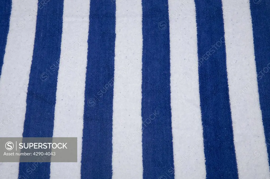 Blue and white striped fabric on a sunlounger, India