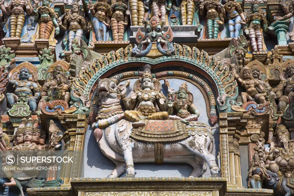 Carved Hindu deity and animal figure, Meenakshi Temple, Madurai, Tamil Nadu, India