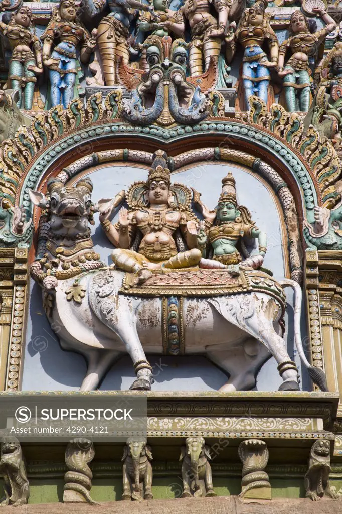 Carved Hindu deities and animal figure, Meenakshi Temple, Madurai, Tamil Nadu, India