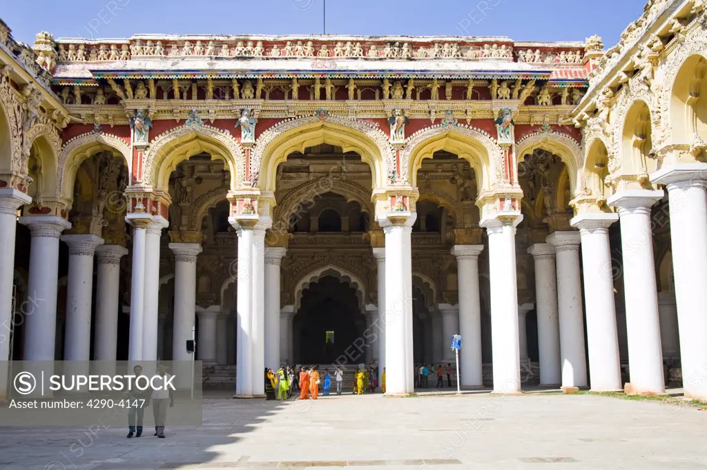 Tourists, arches, columns and courtyard, Thirumalai Nayak Palace, Madurai, Tamil Nadu, India
