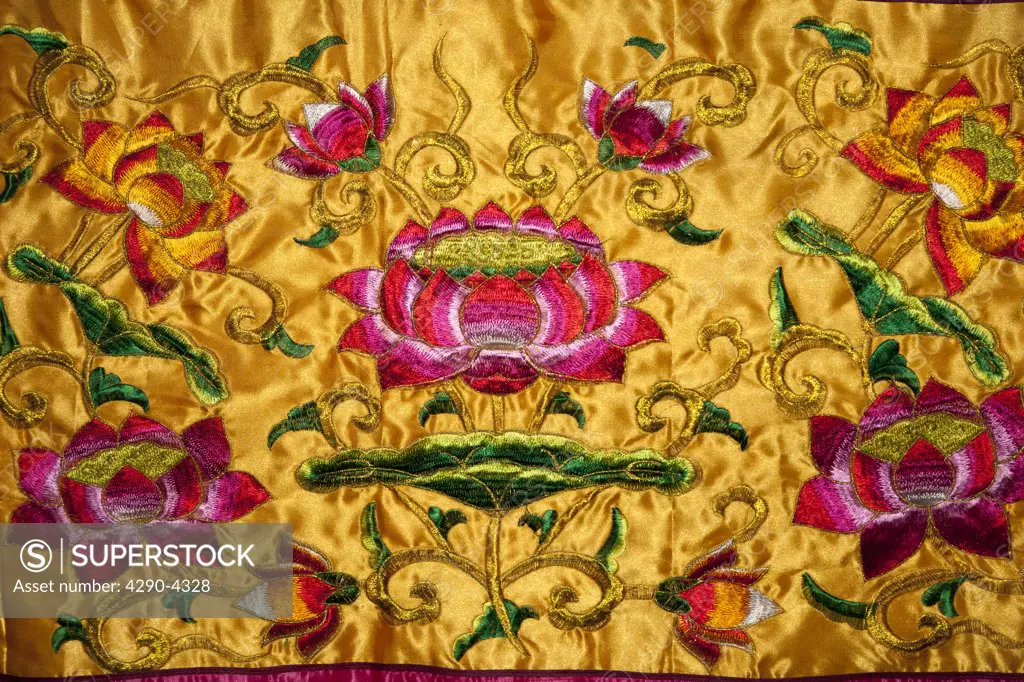 Colourful Chinese embroidered silk prayer stool, Luoyang Folklore Museum, Luoyang, China