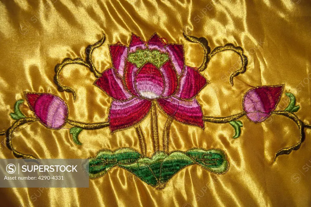 Colourful Chinese embroidered silk prayer stool, Luoyang Folklore Museum, Luoyang, China