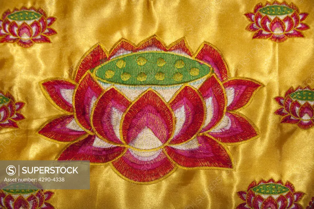 Colourful Chinese embroidered silk prayer stool, of lotus flower, Luoyang Folklore Museum, Luoyang, China